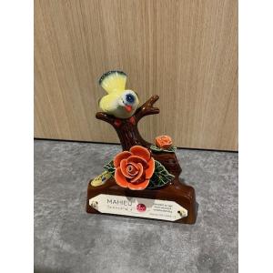 Branche avec oiseau orange